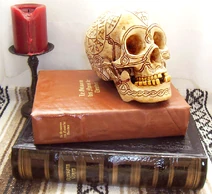 Bob runes - on books, red candle