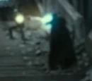 Unidentified Hogwarts student who fought against a Death Eater with a golden spell
