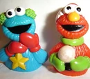 Elmo Saves Christmas finger puppet cups