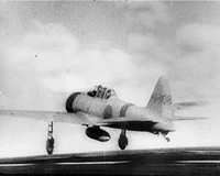 A Zero taking off from an aircraft carrier.