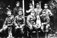 A young Adolf Hitler (left) posing with his fellow German soldiers.
