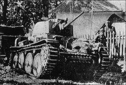 A LT vz. 38 light tank is taking position in the village of Němčice on October 23, 1938.