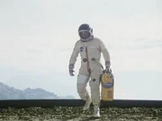 Steve enters Norris in his environment suit