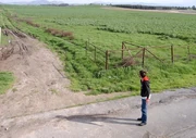A fan stands where Marty once stood. (Credit:BTTFtour.com)