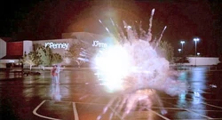 The car explodes in front of Doc and Marty.