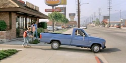 Marty riding past the Burger King.