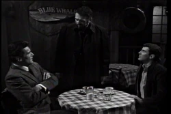 Burke, Bill and Joe share a tense moment at The Blue Whale