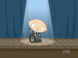 Stewie singing in his wheelchair