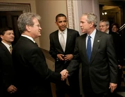 Senate bill sponsors Tom Coburn (R-OK) and Obama join President Bush at the signing ceremony for the  Coburn-Obama Transparency Act of 2006.