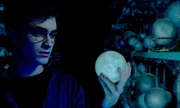 Harry Potter holding his prophecy.