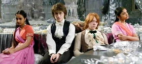 Ron with Harry and the Patil twins at the Yule Ball.