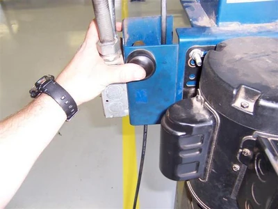 When it's time to lower the vehical, lift it up a little, then operatate the catch release and lower the vehical.