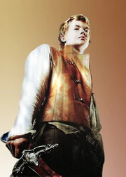Eragon, as portrayed by Ed Speleers, with Zar'roc.