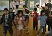 Kids doing the TPR warm-up.