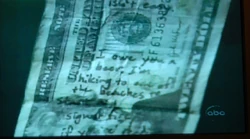 Mitad superior del billete de 20$ del Henry Gale original.