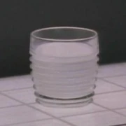 A glass of hot milk with nutmeg