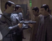 Posing as Romulan soldier.