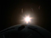 A photon torpedo used as a "warp flare"