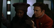 Guinan meets Pavel Chekov in 2293