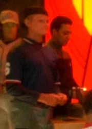 An unknown actor as photo double for Rene Auberjonois