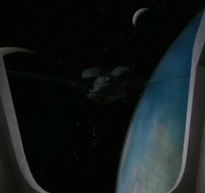Bird-of-Prey before Bajor VIII and two of its moons