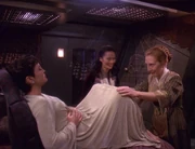Delivering Kirayoshi O'Brien in a traditional Bajoran birthing ceremony