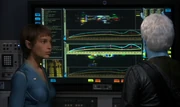 T'Pol shows Shran that the energy signatures are identical