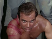 Kirk buckles under Spock's weight