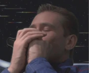 Trip plays the harmonica