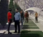 ...as a Starfleet extra on the mall (center behind)