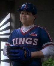 Buck Bokai, a baseball player mentioned throughout the DS9 series, makes an appearance in his London Kings uniform.