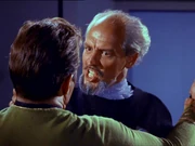 Prefect Jaris possessed by Redjac attempting to kill James T. Kirk
