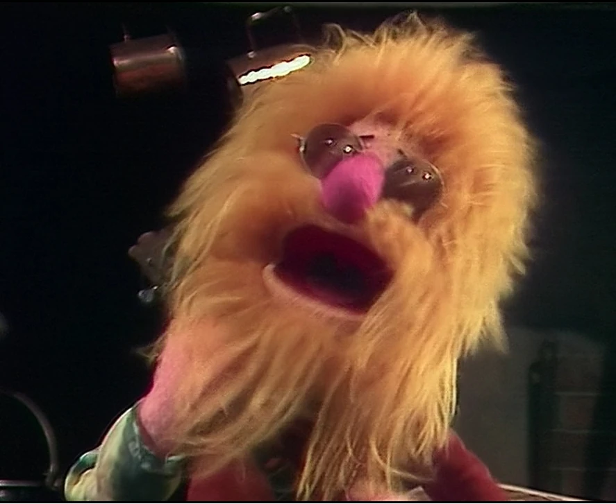 Zeke with Slim Wilson in The Great Muppet Caper