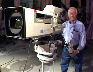 Frank Biondo, both before and behind the camera, in "Elmo's World: Cameras."