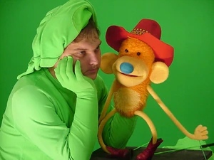 Rickey Boyd in a serious pose with Waffle on the set of Animal Jam.