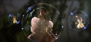 Crystals dance about Sarah's head at the start of her hallucination.