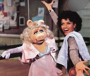 Debbie Allen and Miss Piggy.