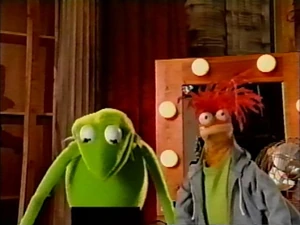 Kermit realizes he is naked.