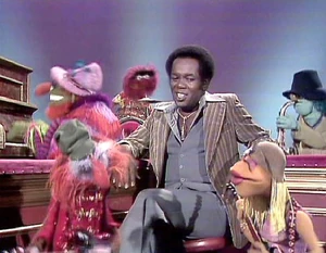 The Electric Mayhem provies back-up to Lou Rawls