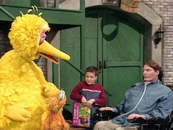 Reeve and his son Will with Big Bird and Zoe in a Season 31 episode of Sesame Street.