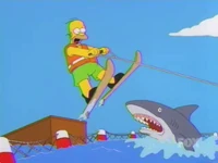 Homer Pulando Sobre Um Tubarão