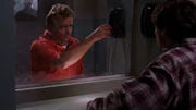 Clark visits his father in jail.