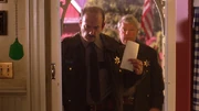 Deputy Miller delivers a warrant.