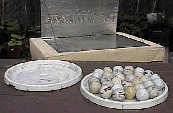 A revolving base can be made using golfballs.