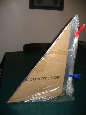 The whole cooker is enclosed in a Reynolds turkey size oven bag. The opening of the bag is rolled up at the back of the cooker and secured with a couple of clothespins