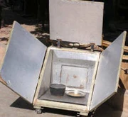 A wooden solar box cooker based on a model by Gnibouwa Diassana