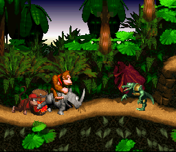 Donkey Kong rides an animal helper named Rambi, with Diddy Kong behind him and a Kremling under K. Rool's employ in front.