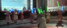 Master Yoda teaches lightsaber combat to younglings.