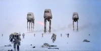 AT-ATs march into battle as Rebel troops retreat.