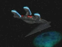 The Excelsior approaches the black hole.